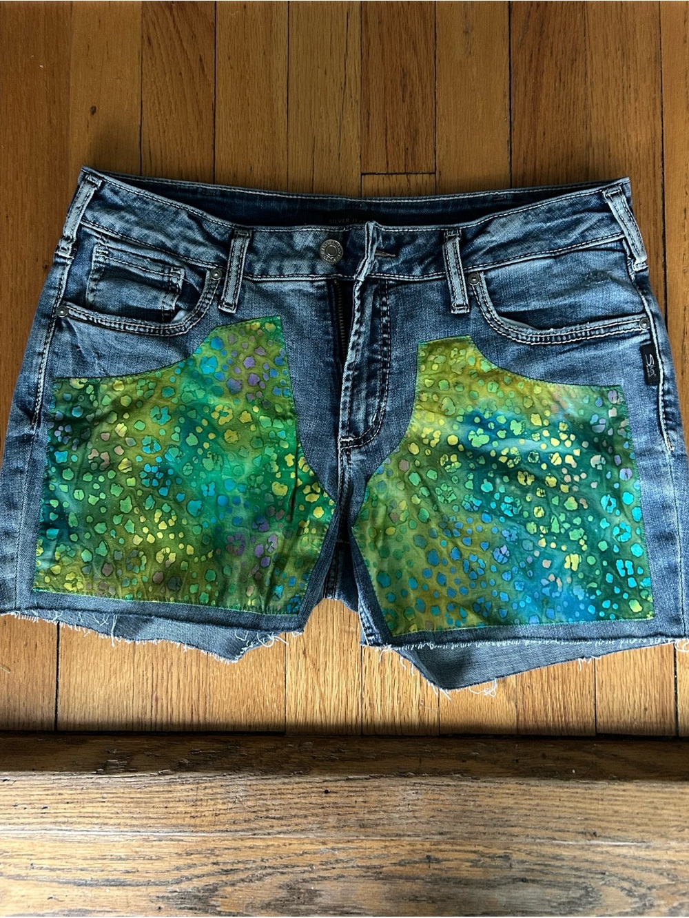 Silver Jeans Distressed Denim Shorts with Green-Blue Painted Panels